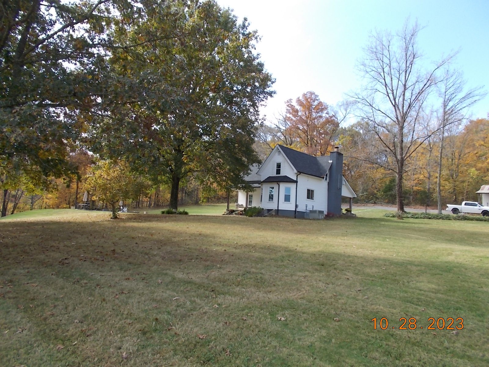 260 Round Top Road Alexandria, TN 37012 - Photo 20 of 65 a front view of a house with a yard