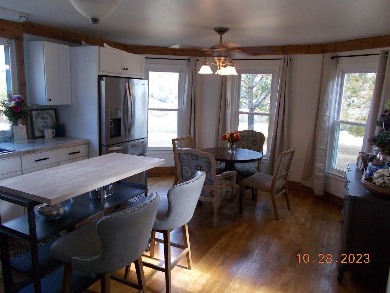 260 Round Top Road Alexandria, TN 37012 - Photo 32 of 65 a view of a dining room with furniture window and wooden floor