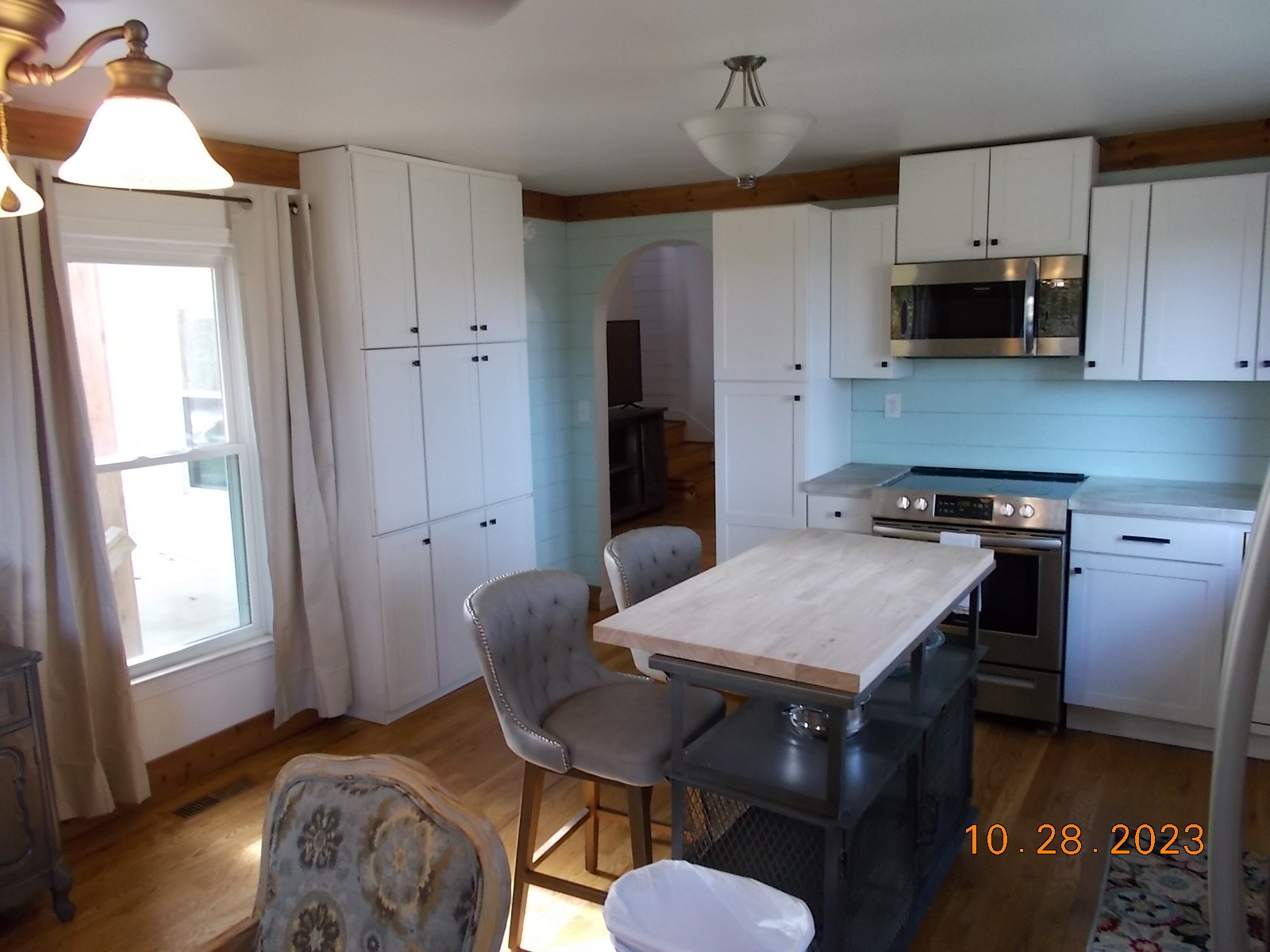 260 Round Top Road Alexandria, TN 37012 - Photo 37 of 65 a kitchen with stainless steel appliances granite countertop a stove refrigerator sink and microwave
