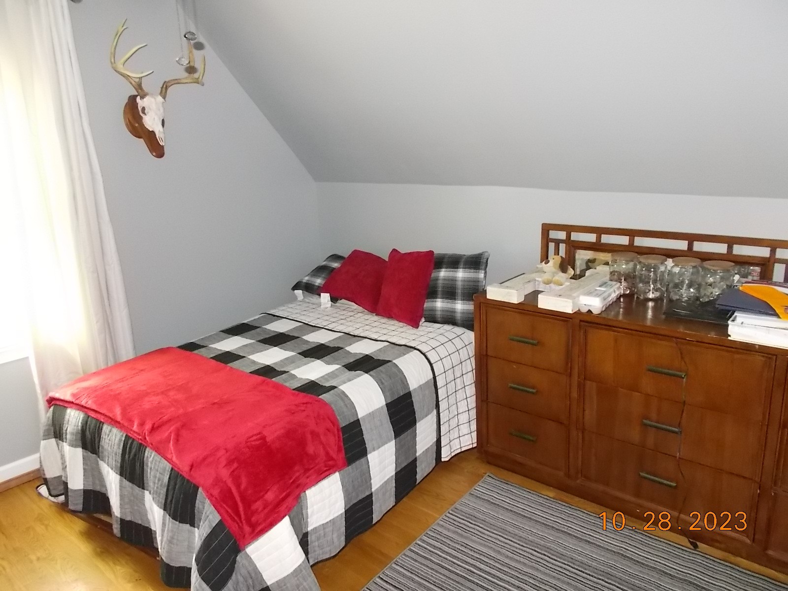 260 Round Top Road Alexandria, TN 37012 - Photo 48 of 65 a bedroom with a bed and wooden floor
