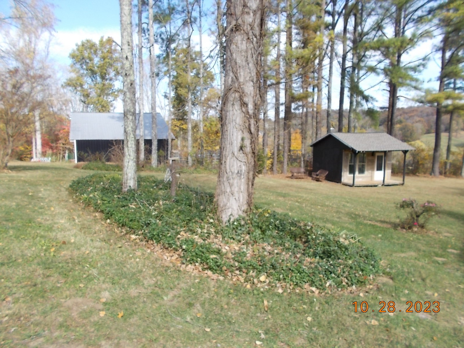 260 Round Top Road Alexandria, TN 37012 - Photo 51 of 65 a front view of a house with garden