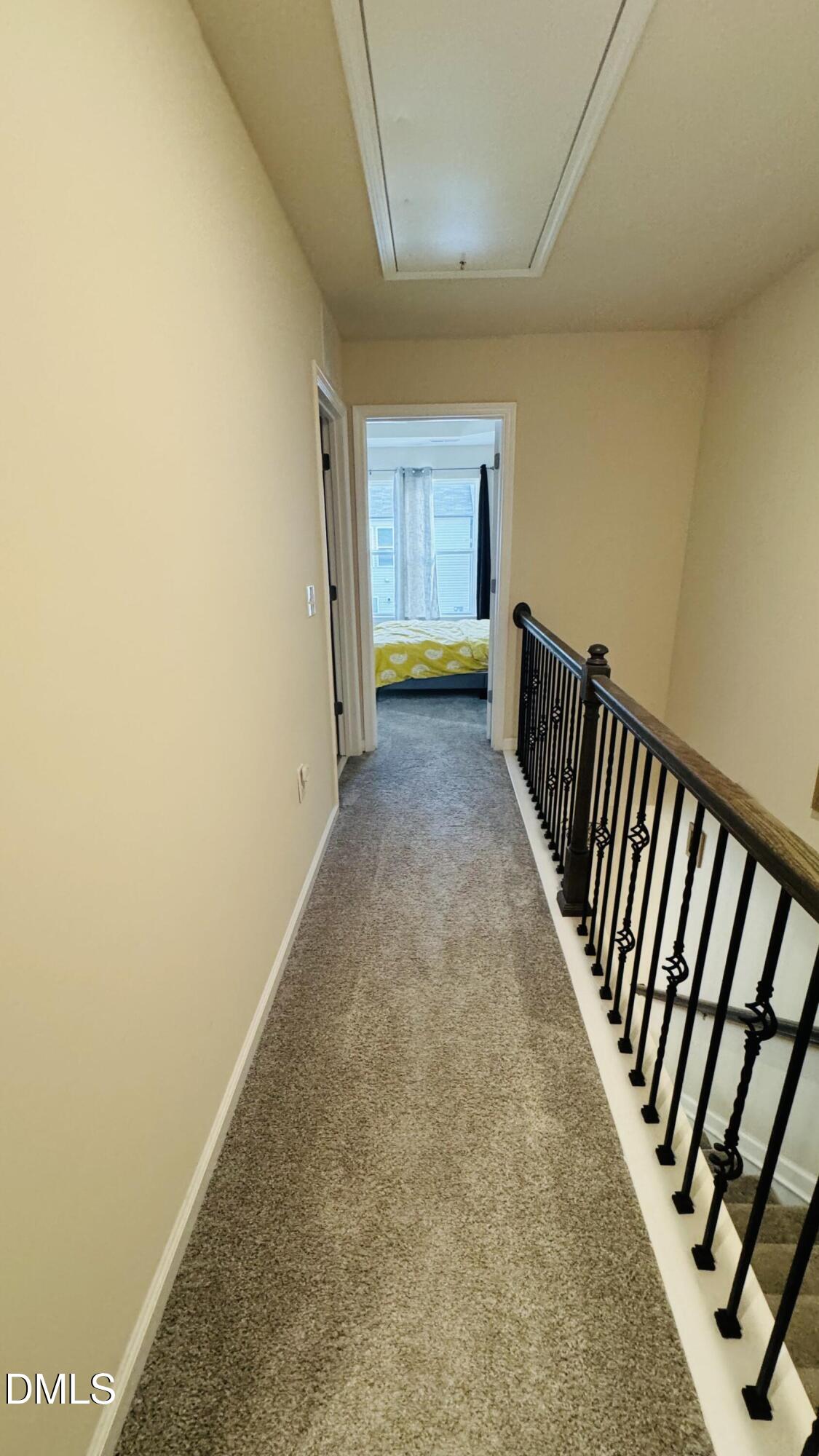 4218 Congleton Place Durham, NC 27703 - Photo 8 of 19 a view of a hallway with wooden floor and stairs