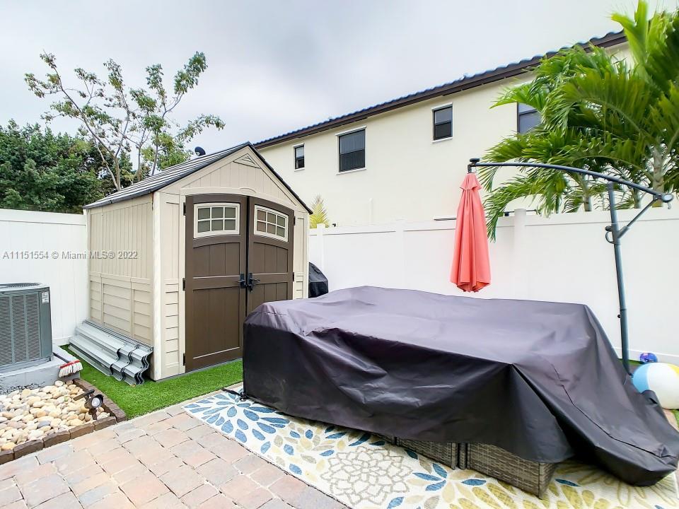 9326 West 33rd Lane Hialeah, FL 33018 - Photo 27 of 52 a front view of house with yard