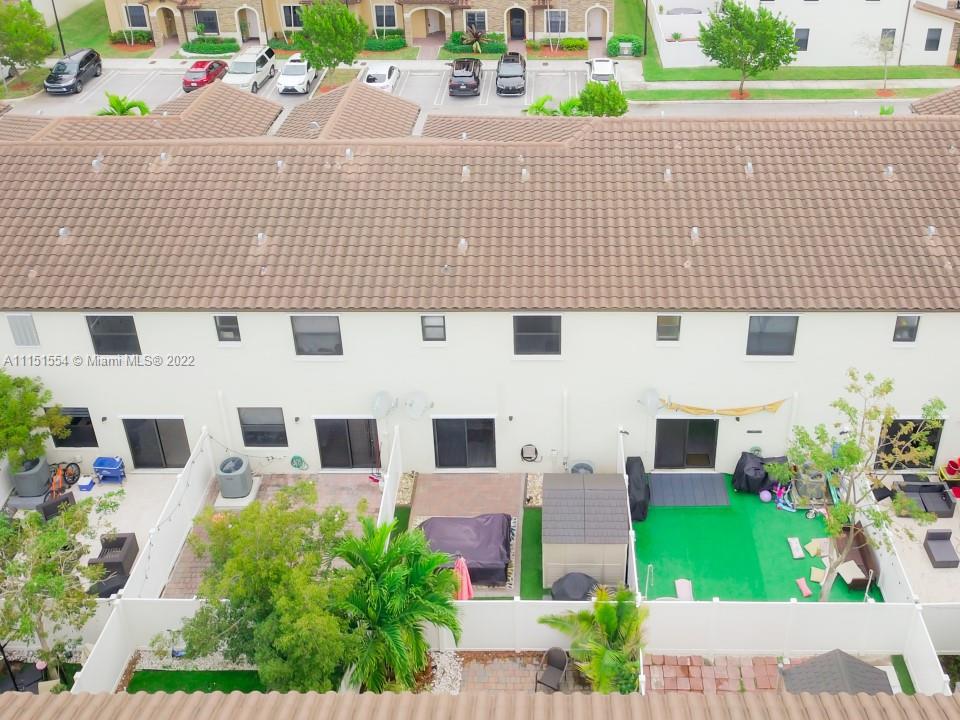 9326 West 33rd Lane Hialeah, FL 33018 - Photo 31 of 52 a front view of a house with a garden