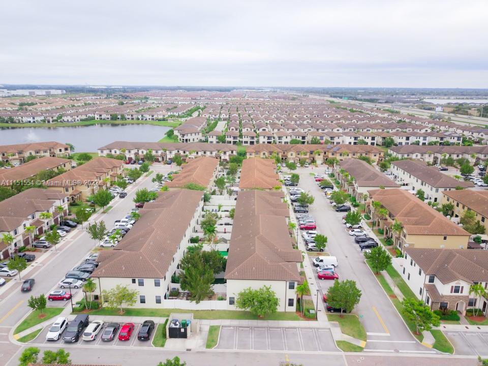 9326 West 33rd Lane Hialeah, FL 33018 - Photo 36 of 52 an aerial view of residential building and lake