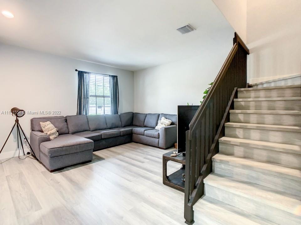 9326 West 33rd Lane Hialeah, FL 33018 - Photo 41 of 52 a living room with furniture and stairs