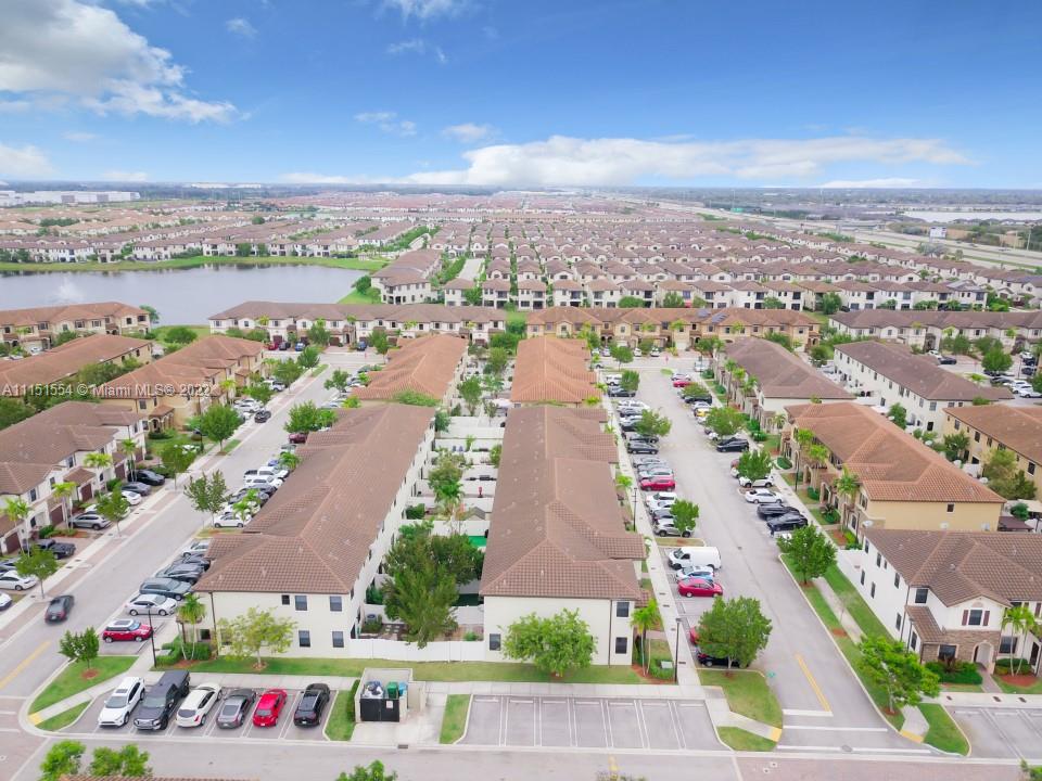 9326 West 33rd Lane Hialeah, FL 33018 - Photo 43 of 52 an aerial view of residential building and lake