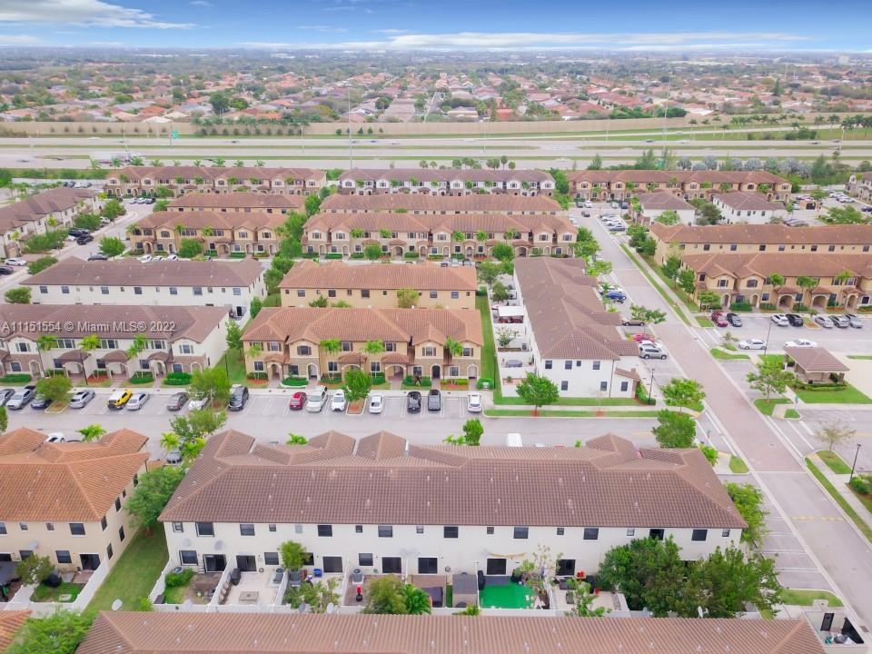 9326 West 33rd Lane Hialeah, FL 33018 - Photo 45 of 52 an aerial view of a city with lots of residential buildings