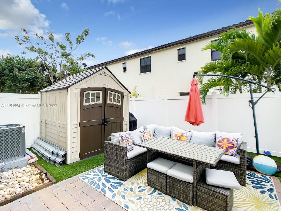 9326 West 33rd Lane Hialeah, FL 33018 - Photo 47 of 52 a outdoor space with patio furniture