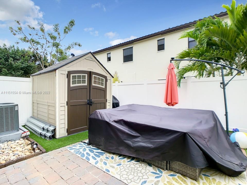 9326 West 33rd Lane Hialeah, FL 33018 - Photo 52 of 52 a front view of house with yard