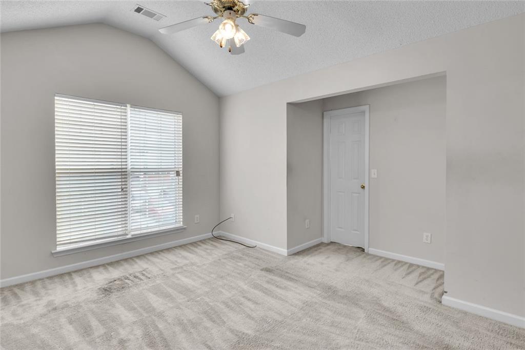 7243 April Court Morrow, GA 30260 - Photo 18 of 29 a view of an empty room with a window