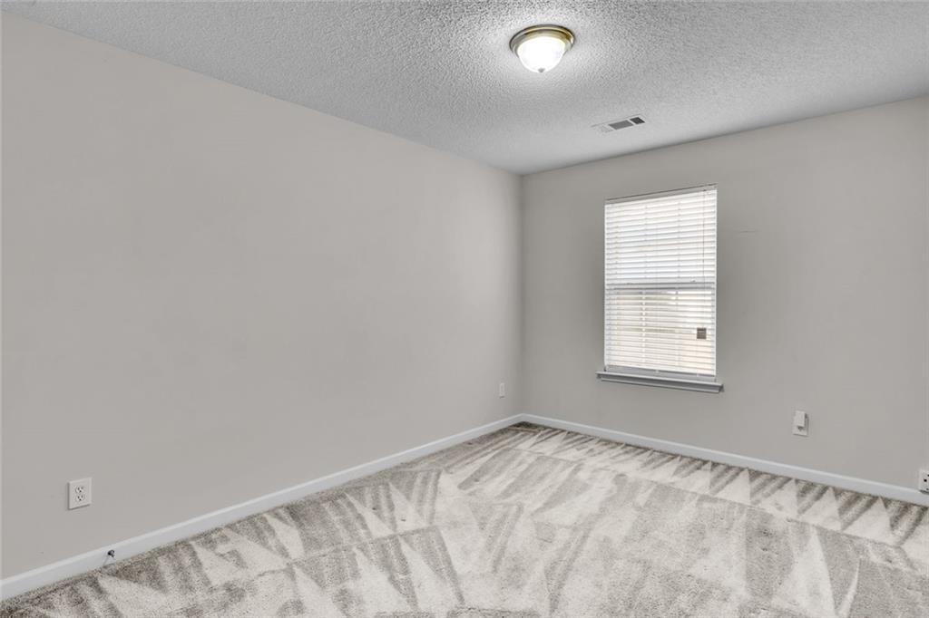 7243 April Court Morrow, GA 30260 - Photo 23 of 29 a view of room with window