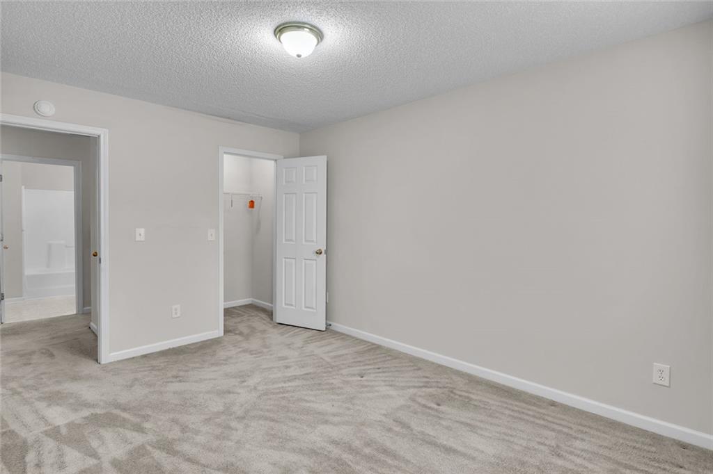 7243 April Court Morrow, GA 30260 - Photo 24 of 29 an empty room with an entryway
