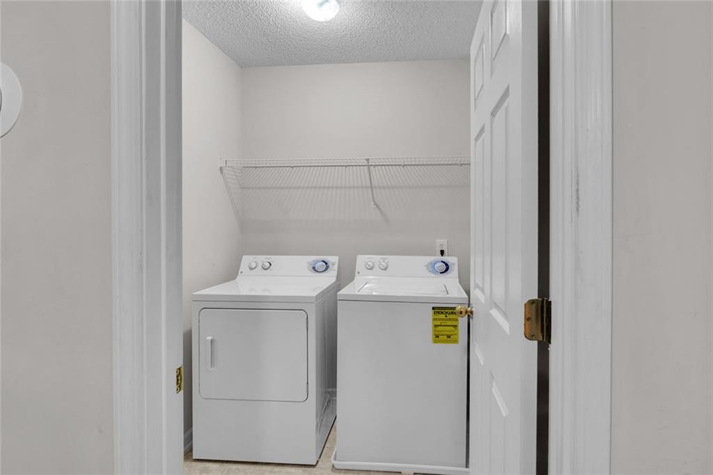 7243 April Court Morrow, GA 30260 - Photo 29 of 29 a utility room with dryer and washer