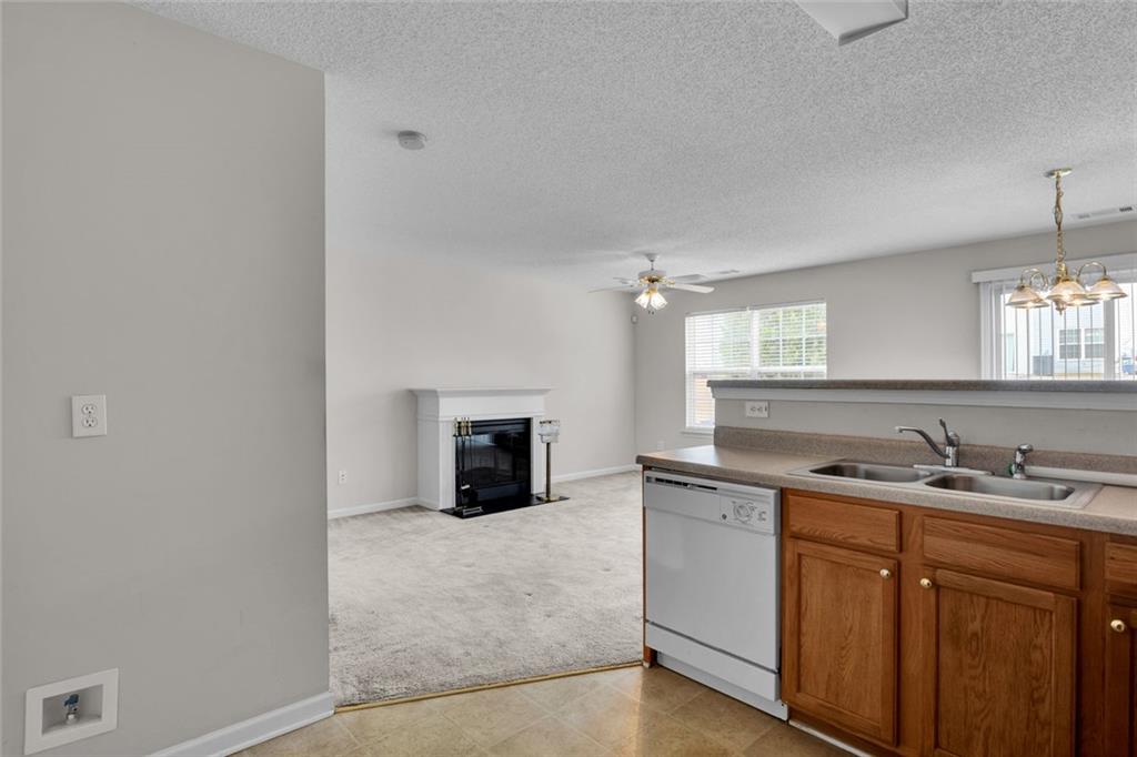 7243 April Court Morrow, GA 30260 - Photo 8 of 29 a kitchen with a sink and cabinets