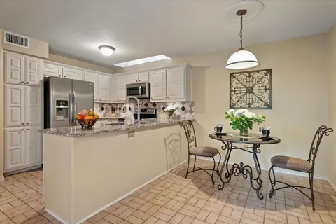 $560,000 | 14683 Plage Lane, Addison, TX 75001