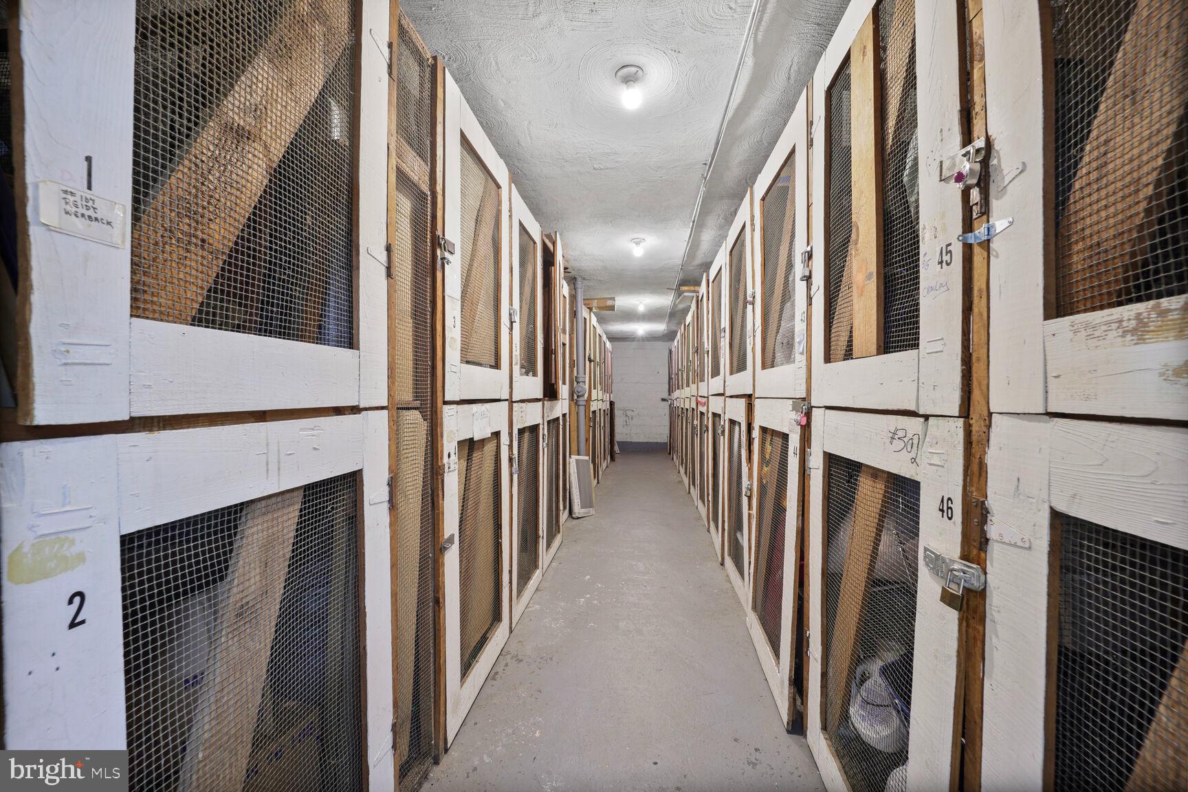 4114 Davis Place Northwest, Unit 311 Washington, DC 20007 - Photo 23 of 37 a view of a hallway with stairs