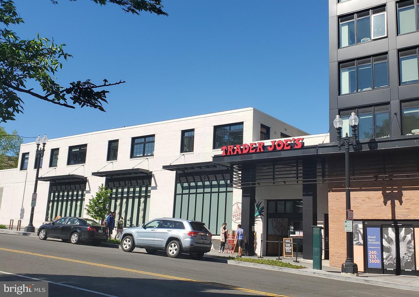 4114 Davis Place Northwest, Unit 311 Washington, DC 20007 - Photo 28 of 37 a view of a building and a yard