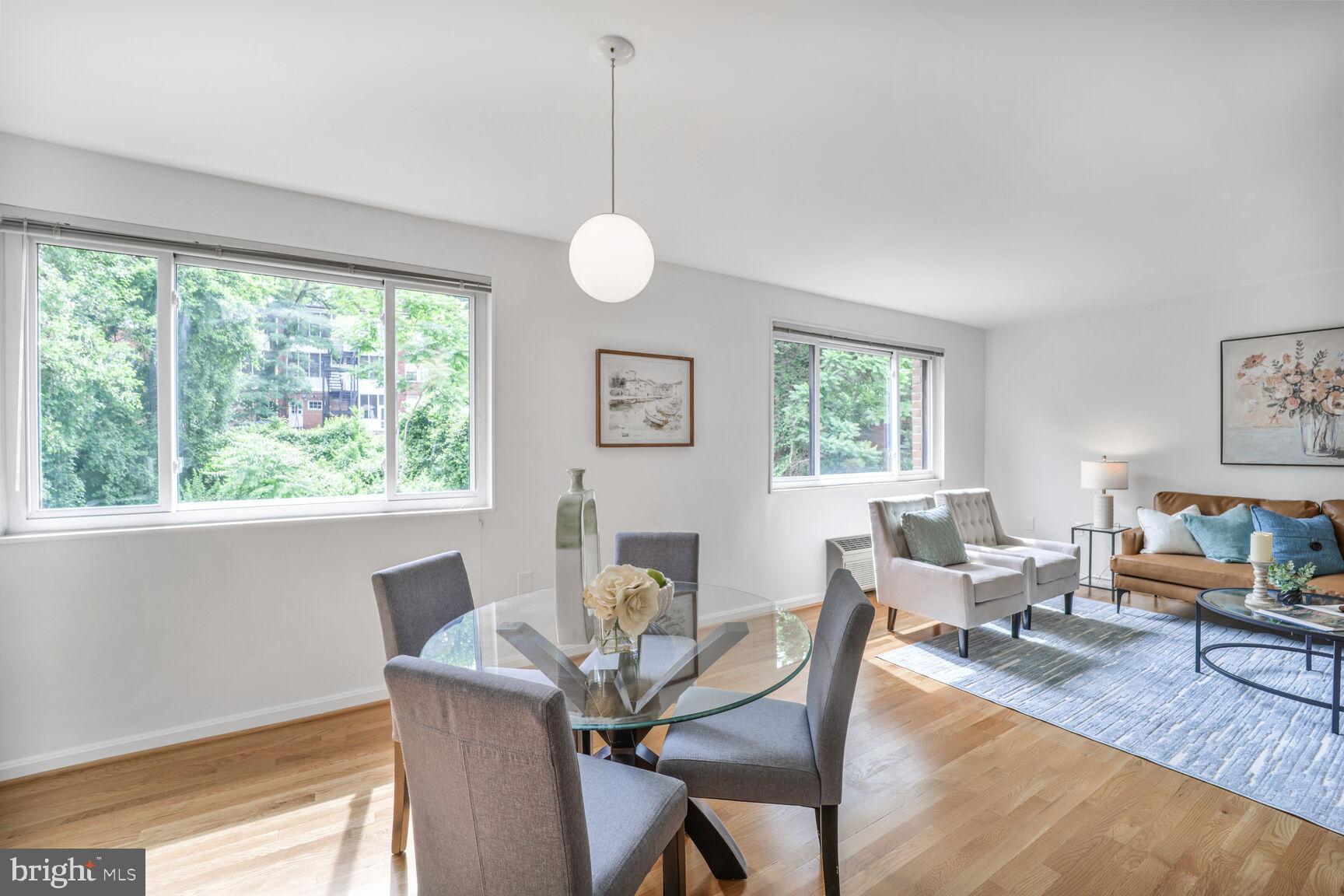 4114 Davis Place Northwest, Unit 311 Washington, DC 20007 - Photo 3 of 37 a view of a dining room with furniture window and outside view