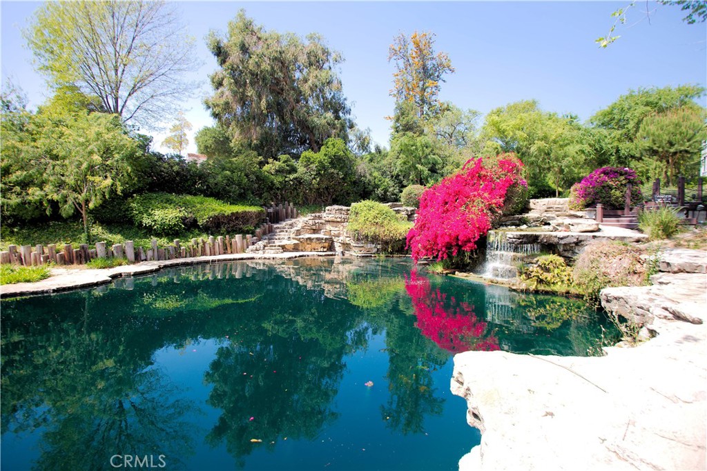 a view of swimming pool with a yard