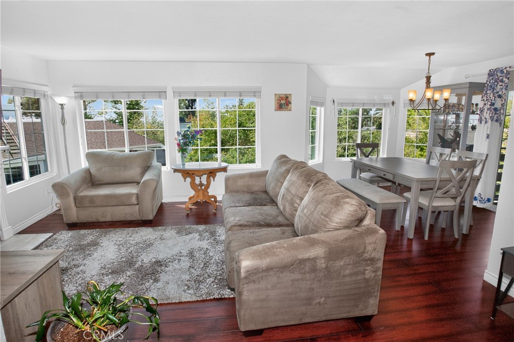 1083 Lakeview Terrace Azusa, CA 91702 - Photo 12 of 36 a living room with furniture and a wooden floor