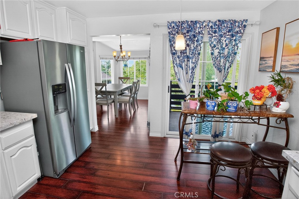 1083 Lakeview Terrace Azusa, CA 91702 - Photo 22 of 36 a view of a dining room with furniture window and wooden floor