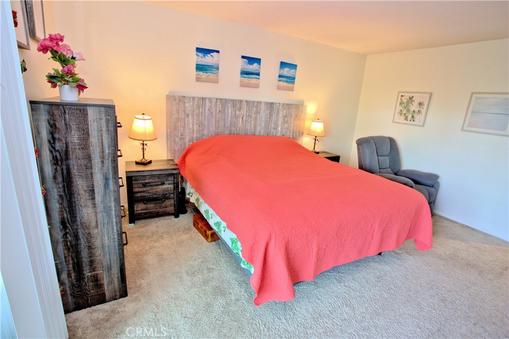 1083 Lakeview Terrace Azusa, CA 91702 - Photo 27 of 36 a bed room with a bed and a couch