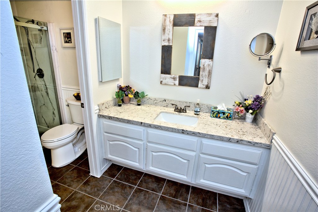 1083 Lakeview Terrace Azusa, CA 91702 - Photo 31 of 36 a spacious bathroom with a double vanity sink mirror and toilet