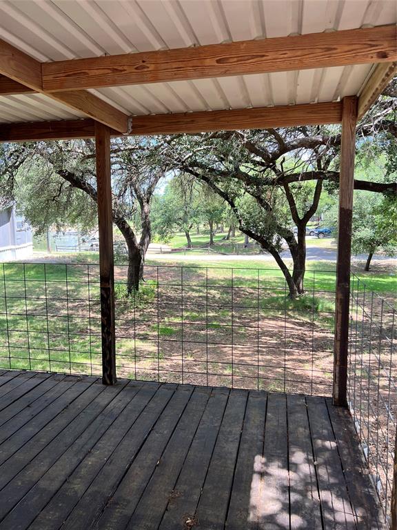 2334 San Bar Road, Unit 46 Graford, TX 76449 - Photo 28 of 37 a view of porch with wooden floor