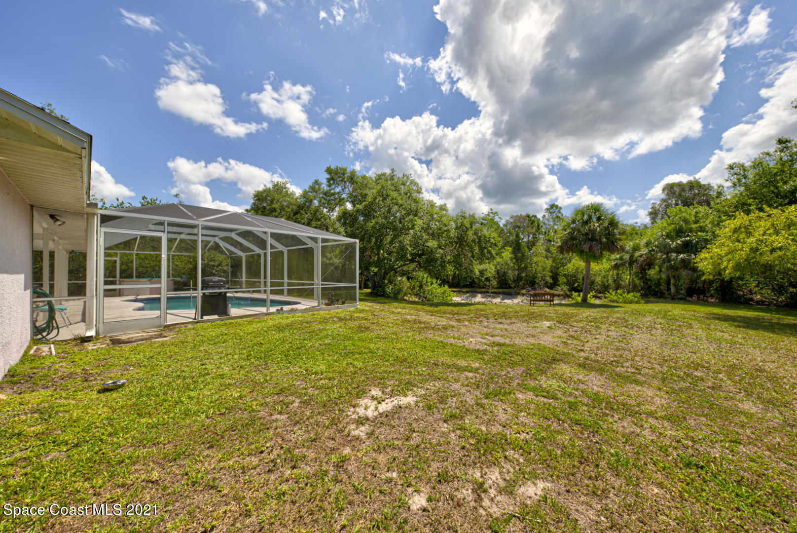 2225 Corey Road Malabar, FL 32950 - Photo 15 of 62 a view of a house with a backyard