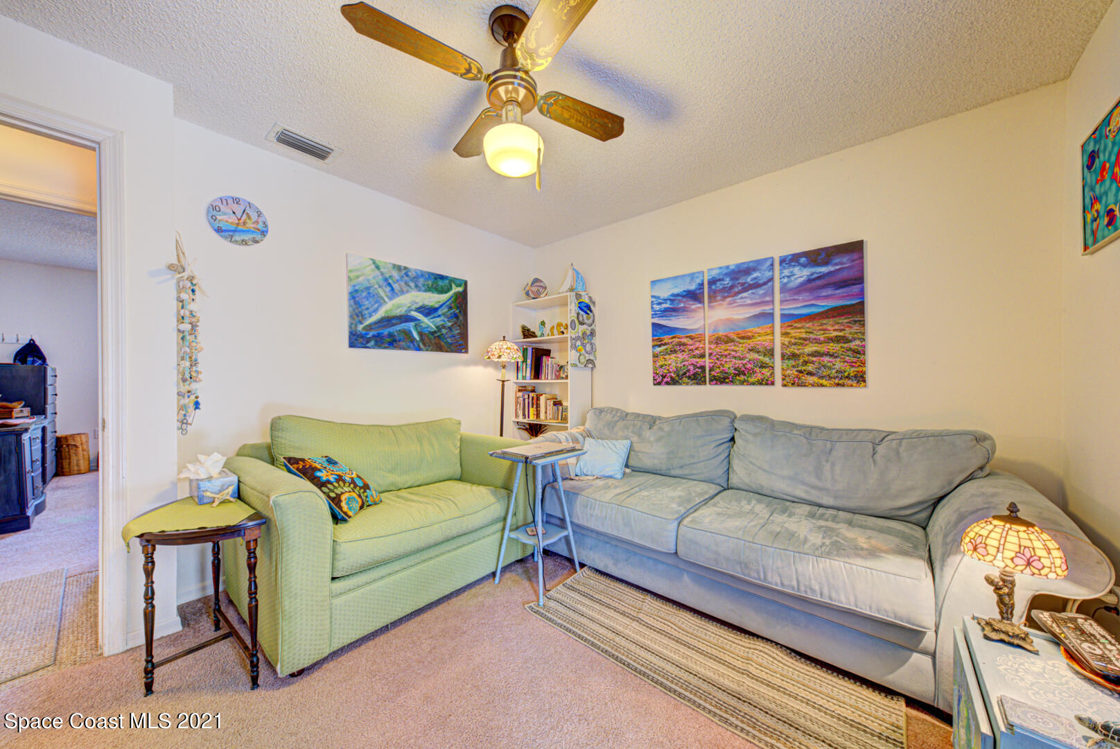 2225 Corey Road Malabar, FL 32950 - Photo 23 of 62 a living room with furniture and a rug