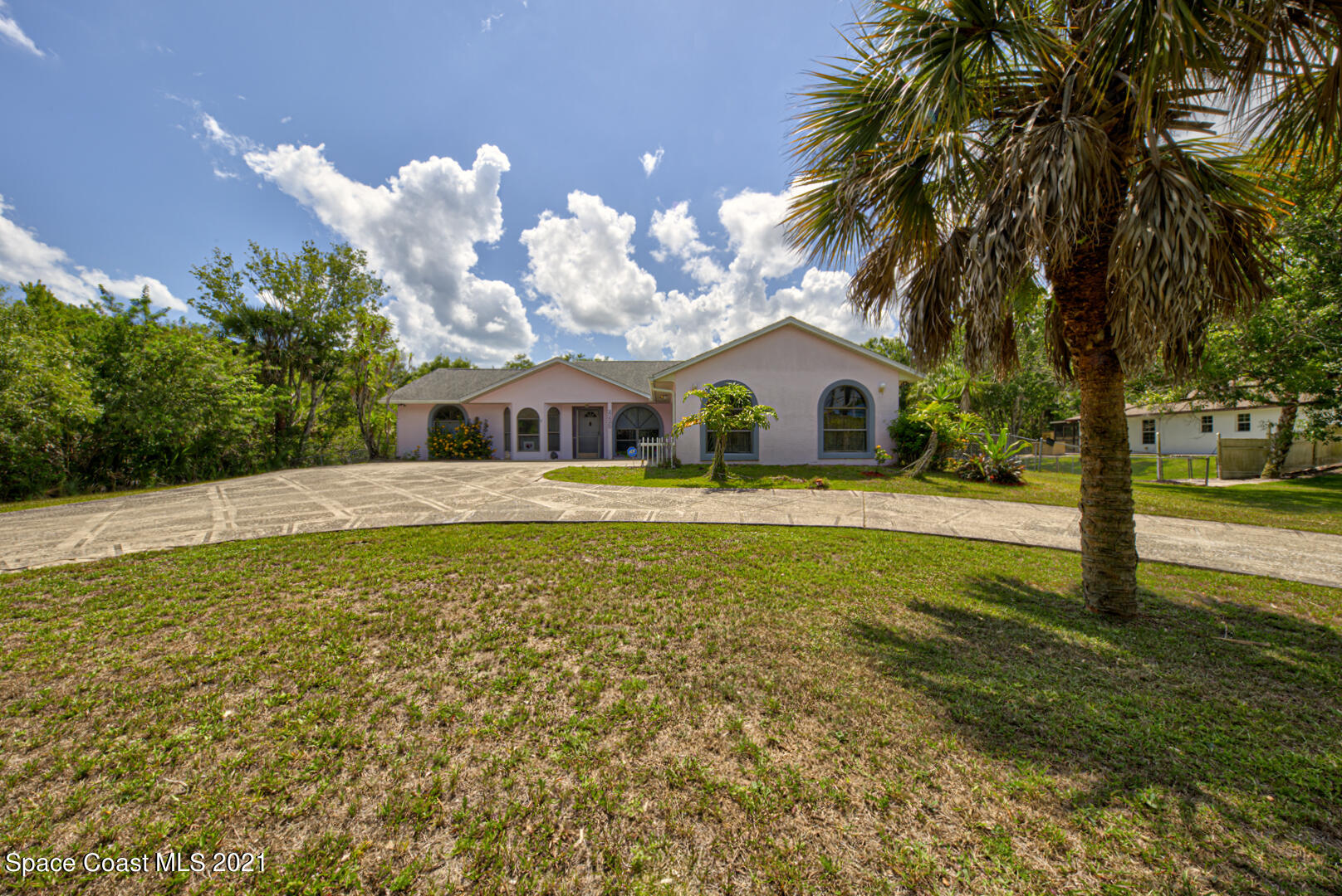 2225 Corey Road Malabar, FL 32950 - Photo 5 of 62 a view of house with outdoor space and swimming pool