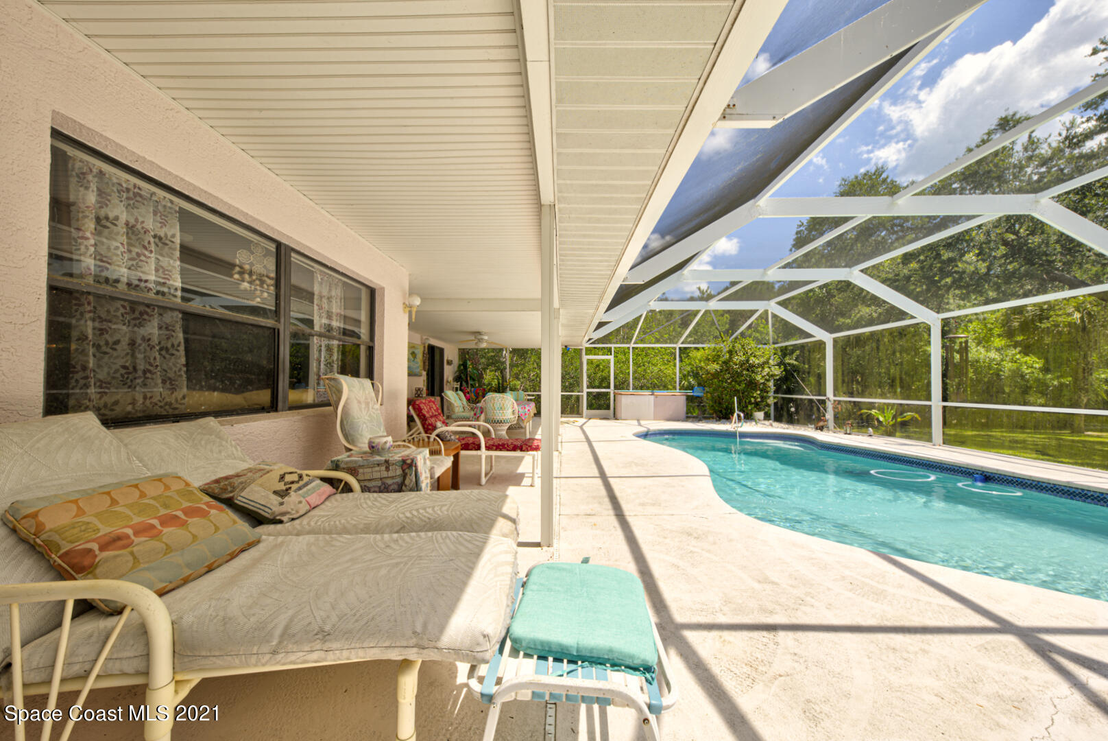 2225 Corey Road Malabar, FL 32950 - Photo 53 of 62 a view of house with swimming pool and sitting area