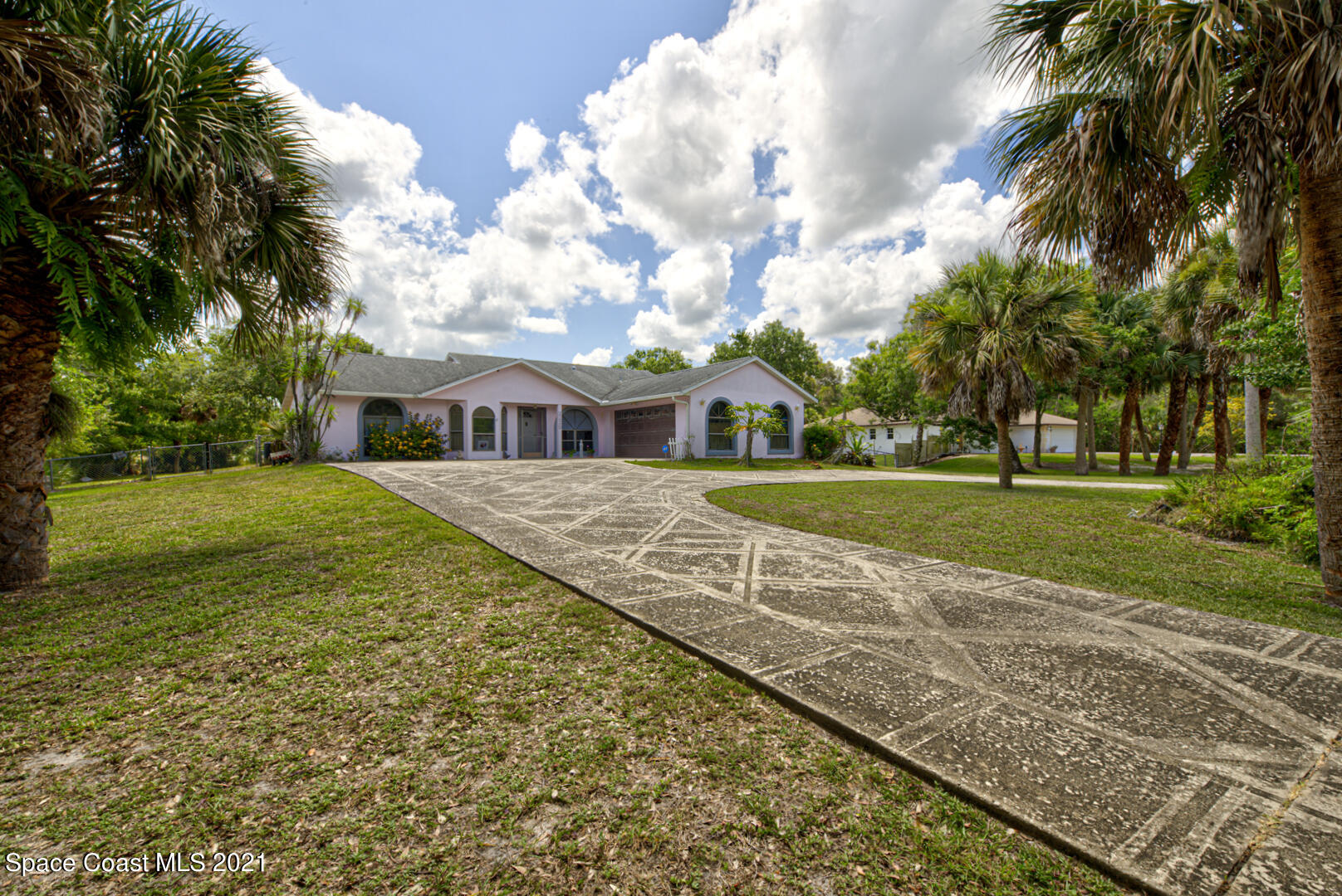 2225 Corey Road Malabar, FL 32950 - Photo 7 of 62 a view of house with yard
