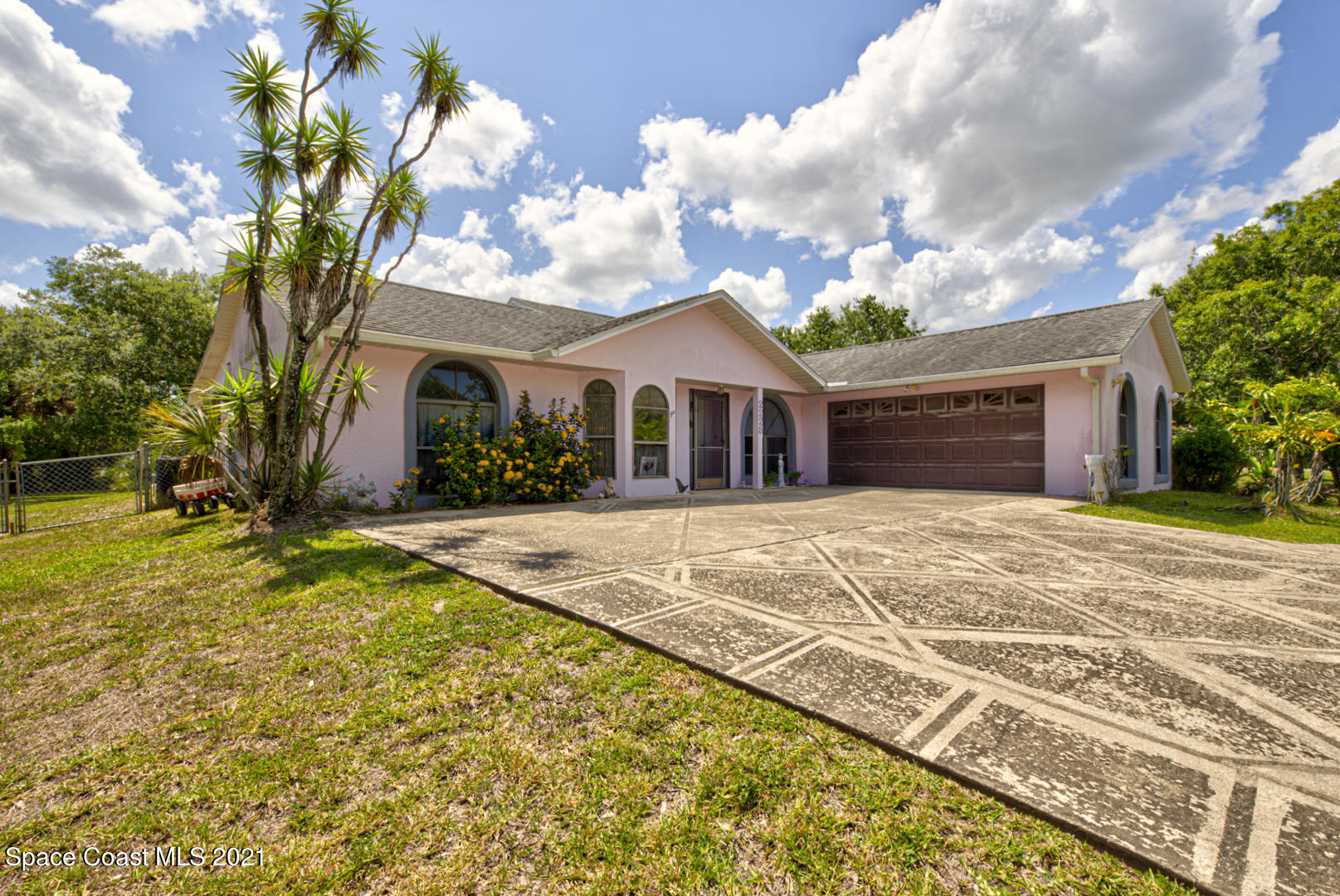 2225 Corey Road Malabar, FL 32950 - Photo 8 of 62 a front view of house with yard