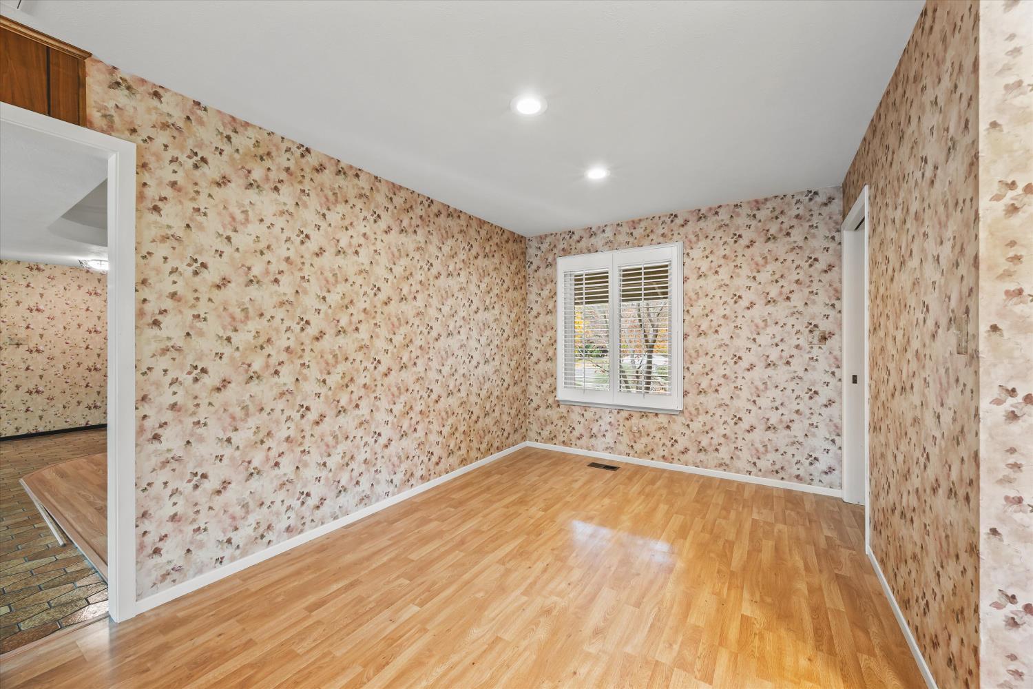 4808 Sherlock Way Carmichael, CA 95608 - Photo 16 of 45 a view of a big room with wooden floor and a window