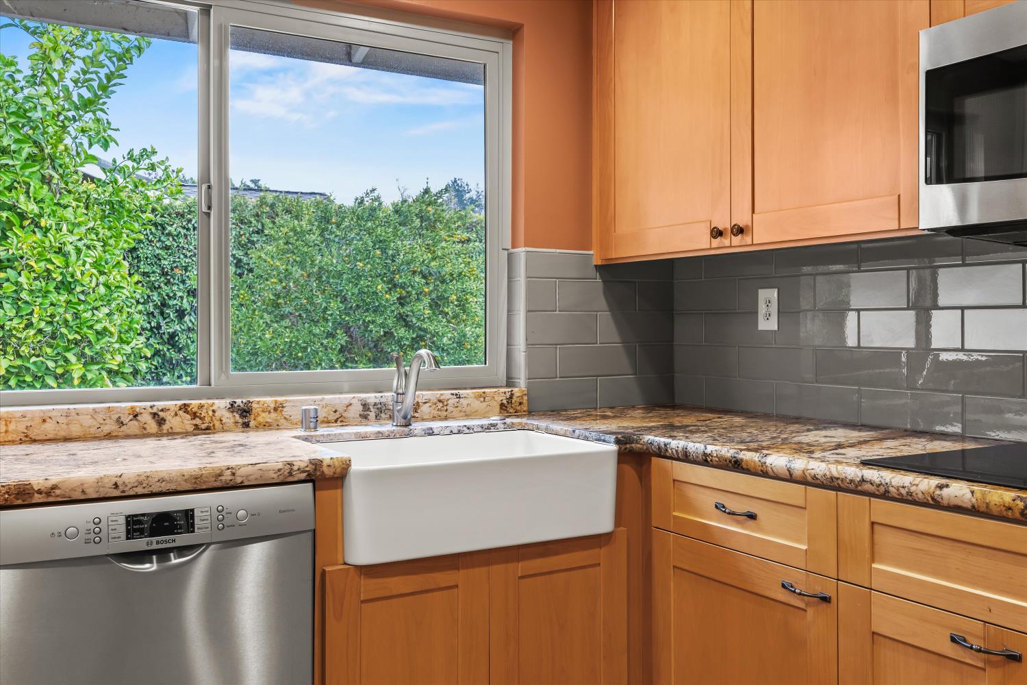 4808 Sherlock Way Carmichael, CA 95608 - Photo 19 of 45 a view of a kitchen with a sink and a window