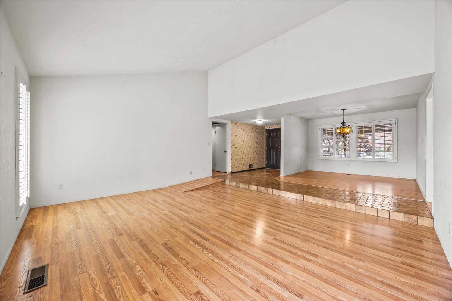 4808 Sherlock Way Carmichael, CA 95608 - Photo 6 of 45 a view of an empty room and wooden floor