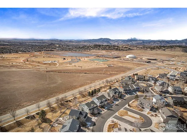 a view of an ocean and a mountain