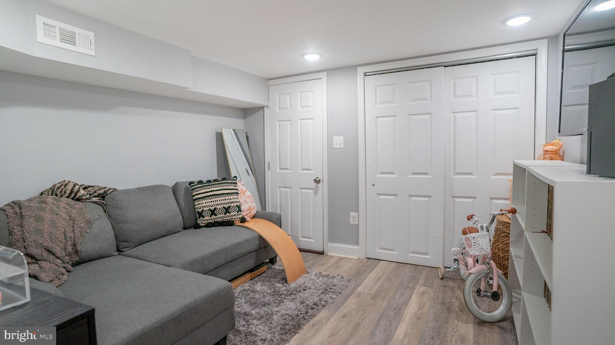 2438 West Seybert Street Philadelphia, PA 19121 - Photo 11 of 21 a livingroom with furniture and a flat screen tv