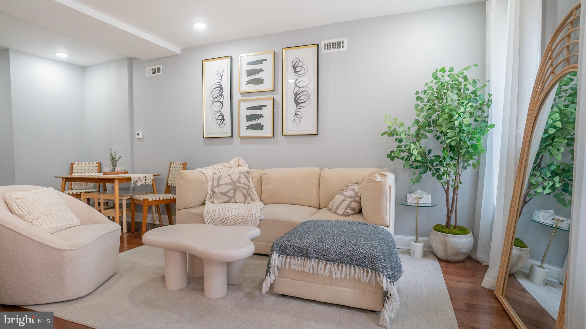 2438 West Seybert Street Philadelphia, PA 19121 - Photo 14 of 21 a living room with furniture and a potted plant