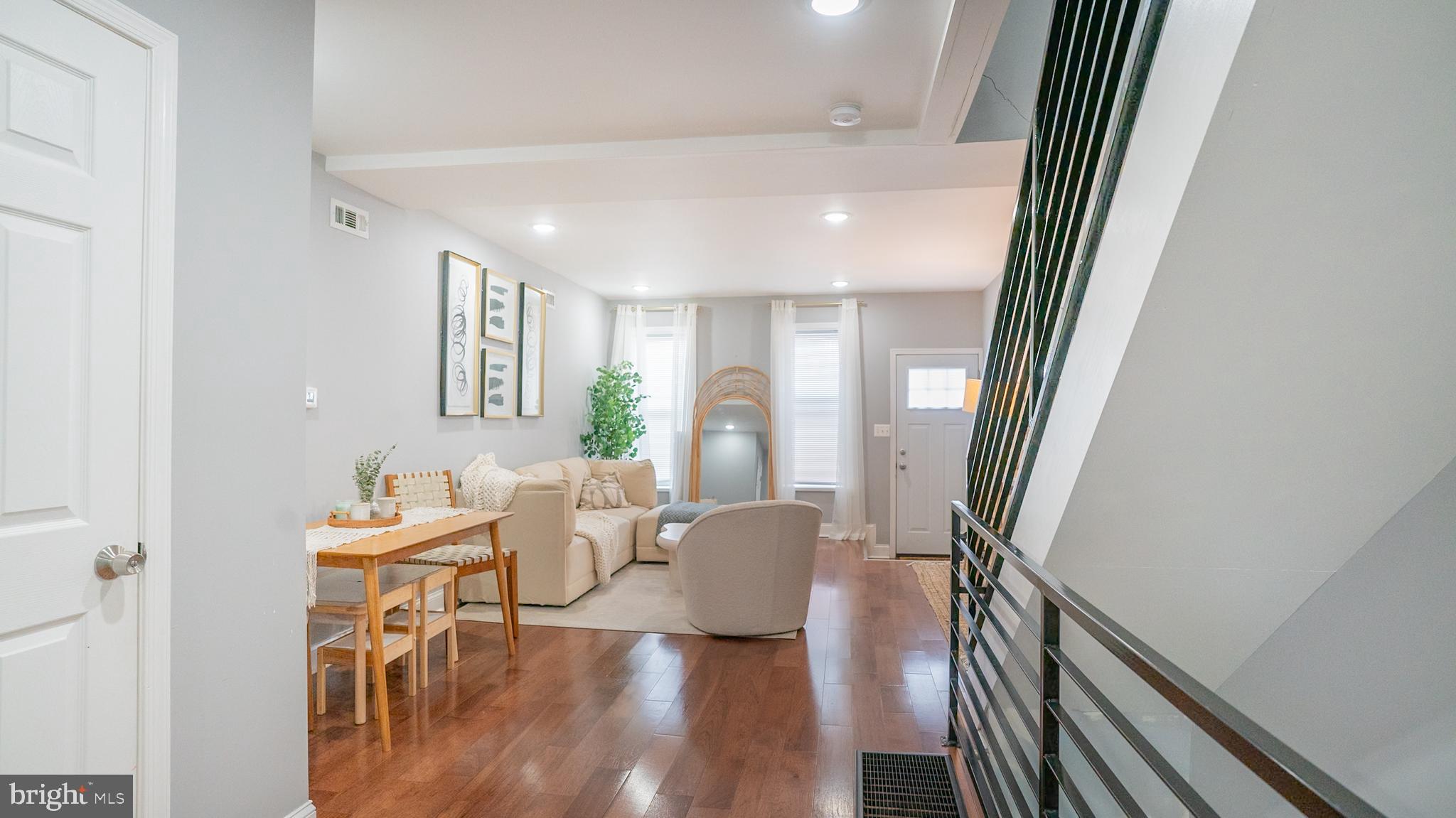 2438 West Seybert Street Philadelphia, PA 19121 - Photo 15 of 21 a view of a livingroom with furniture and hardwood floor