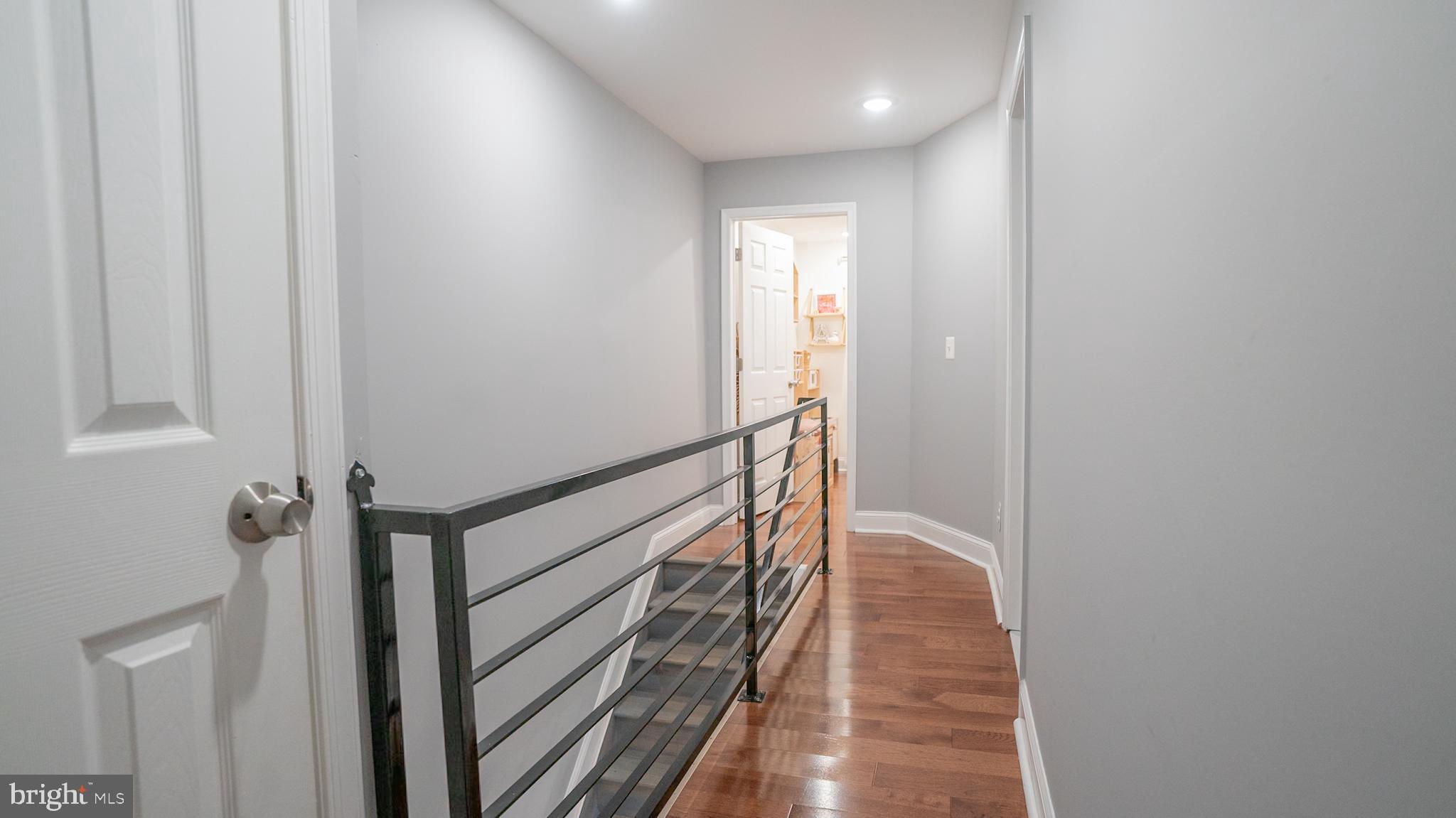 2438 West Seybert Street Philadelphia, PA 19121 - Photo 10 of 21 a view of hallway with stairs
