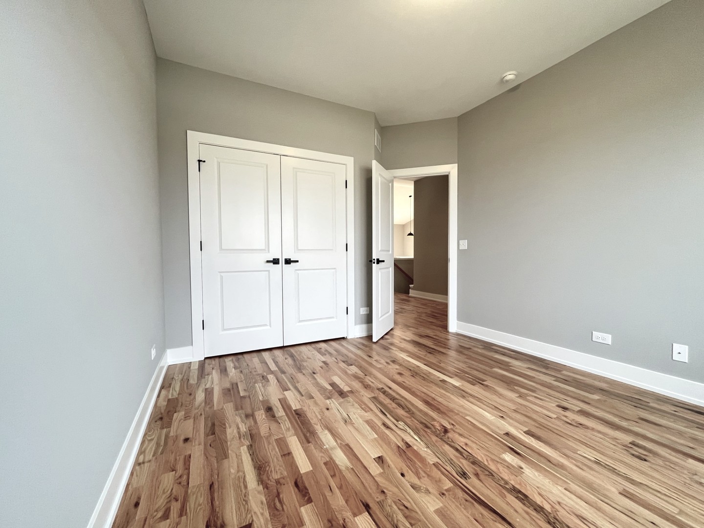 514 Cobblestone Circle Harvard, IL 60033 - Photo 14 of 19 a view of a room with wooden floor and white walls
