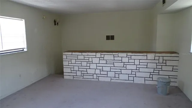 a view of a room with racks on the wall