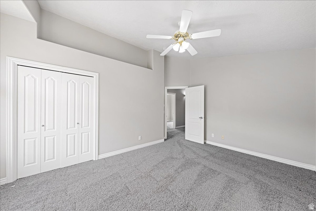 7 Reflection Way St. George, UT 84770 - Photo 35 of 54 Unfurnished bedroom with carpet flooring, a closet, and ceiling fan