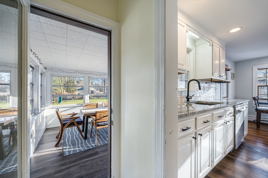 55 Lothrop Road Reading, MA 01867 - Photo 30 of 41 a view of a kitchen from the hallway