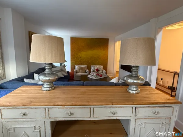 a kitchen with a stove and a table