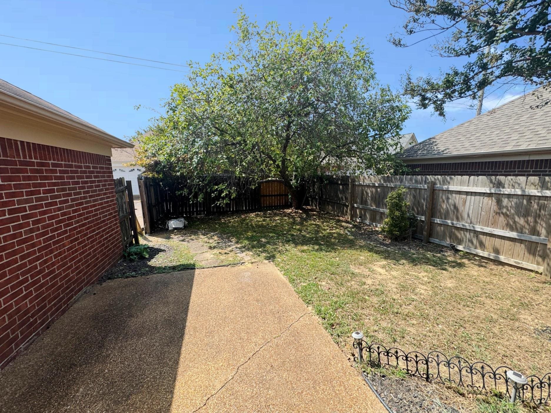 779 North Sanga Road Memphis, TN 38018 - Photo 12 of 12 View of yard with a patio area