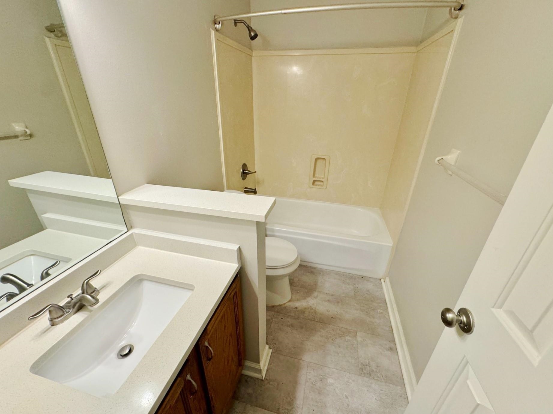 779 North Sanga Road Memphis, TN 38018 - Photo 10 of 12 Full bathroom featuring vanity, toilet, and shower / bath combination